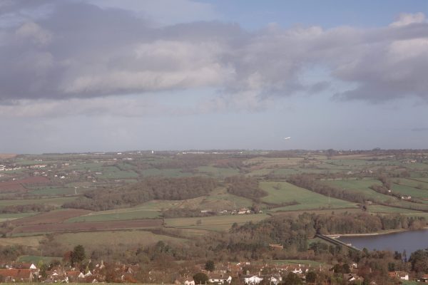 Edge of a lake and fields